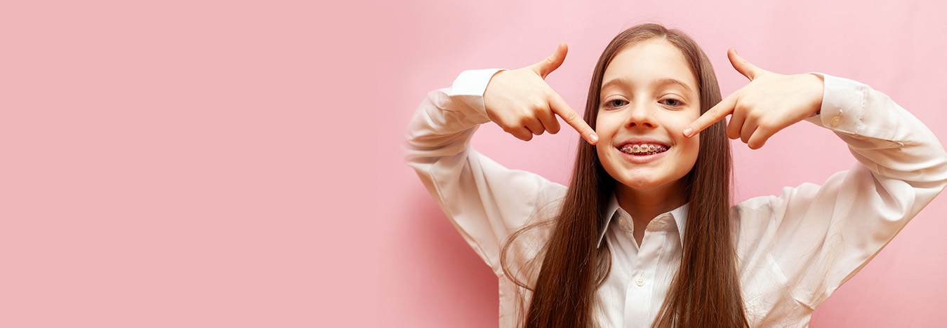 Young patient smiling with braces